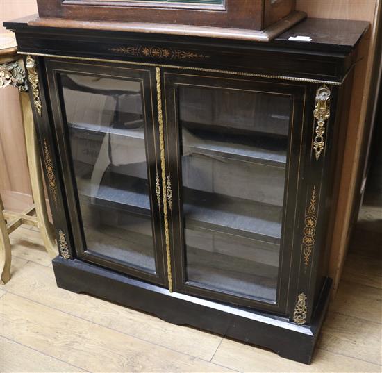 A 19th century French ebonised dwarf bookcase, W.3ft 4in.